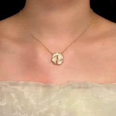 Close-up of the pendant and clasp on the Camellia Necklace