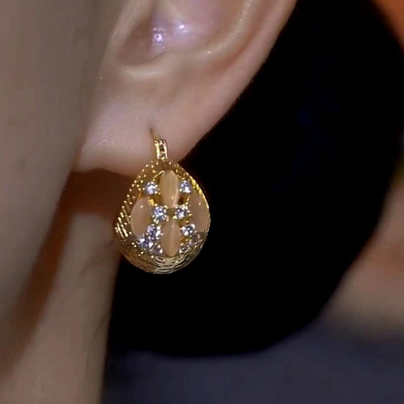 Close-up detail of the sparkling zircons and plating on the Ball Earrings