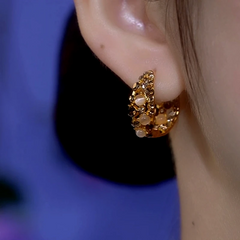 Angled view of the 14K Gold-Plated Cat's Eye Brown Zircon Hoop Earrings