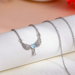 Detailed view of the 14K Gold-Plated Cat's Eye Heart Angel Wing Necklace chain and pendant