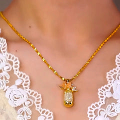 14K Gold-Plated Cat's Eye Stone Flower Mesh Pendant Necklace worn to showcase its length and pendant detail