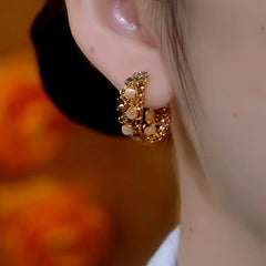 Close-up detail of the sparkling zircons and plating on the Diamond Hoop Earrings