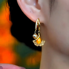 Close-up detail of the sparkling zircons and plating on the Ginkgo Leaf Earrings