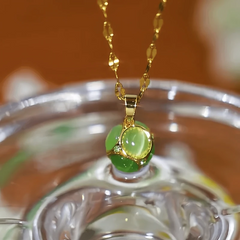 14K Gold-Plated Cat's Eye Stone Green Ball Necklace worn to showcase its length and pendant detail