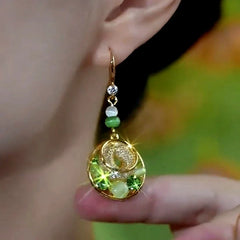 Close-up detail of the sparkling zircons and plating on the Mesh Water Drop Earrings