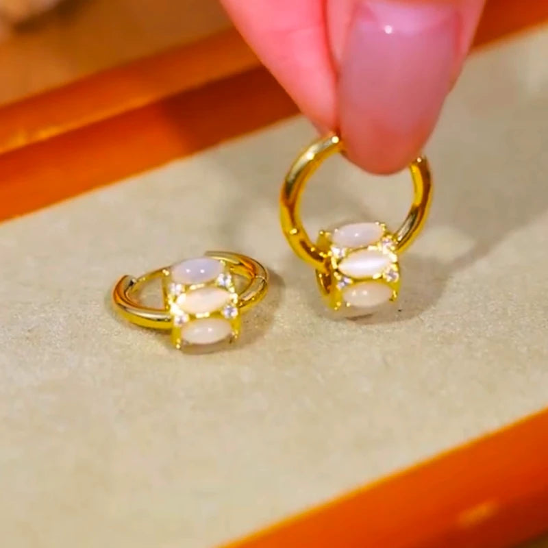 Close-up detail of the sparkling zircons and plating on the Ring Hoop Earrings