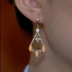 Close-up detail of the sparkling zircons and plating on the Zircon Diamond Earrings