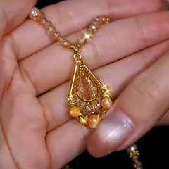 Close-up of the pendant and clasp on the Crystal Drop Necklace