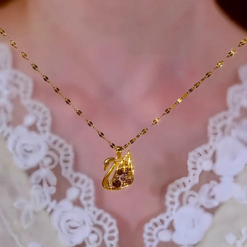14K Gold-Plated Champagne Diamond Swan Pendant Necklace worn to showcase its length and pendant detail