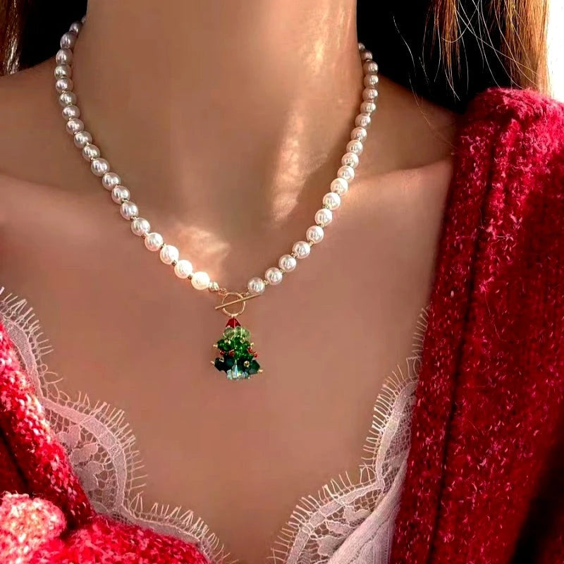 14K Gold-Plated Christams Tree Bell Pearl Necklace worn to showcase its length and pendant detail