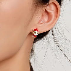 Angled view of the 14K Gold-Plated Christmas Diamond Santa Claus Earrings