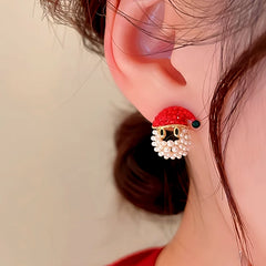 Close-up detail of the sparkling zircons and plating on the Santa Hat Earrings
