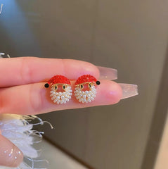 Angled view of the 14K Gold-Plated Christmas Diamond Santa Claus Hat Earrings