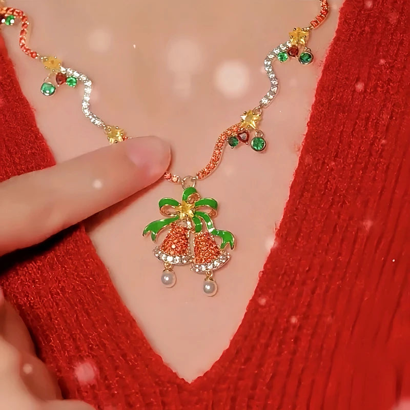 Close-up of the pendant and clasp on the Red Bell Necklace