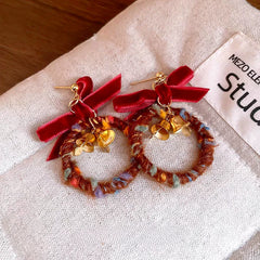 Close-up detail of the sparkling zircons and plating on the Christmas Hoop Earrings