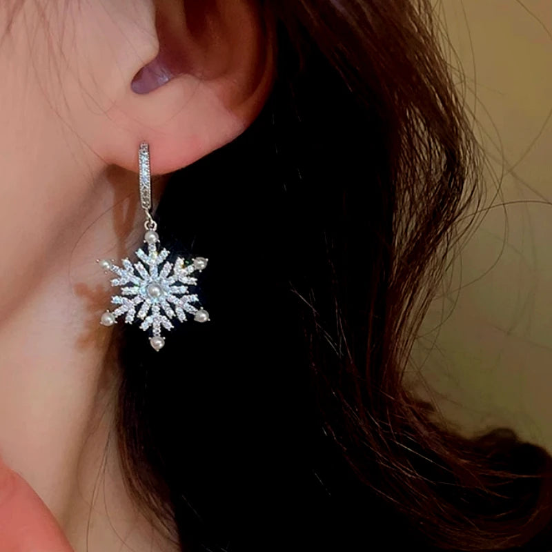 Close-up detail of the sparkling zircons and plating on the Pearl Snowflake Earrings