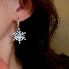 Close-up detail of the sparkling zircons and plating on the Pearl Snowflake Earrings