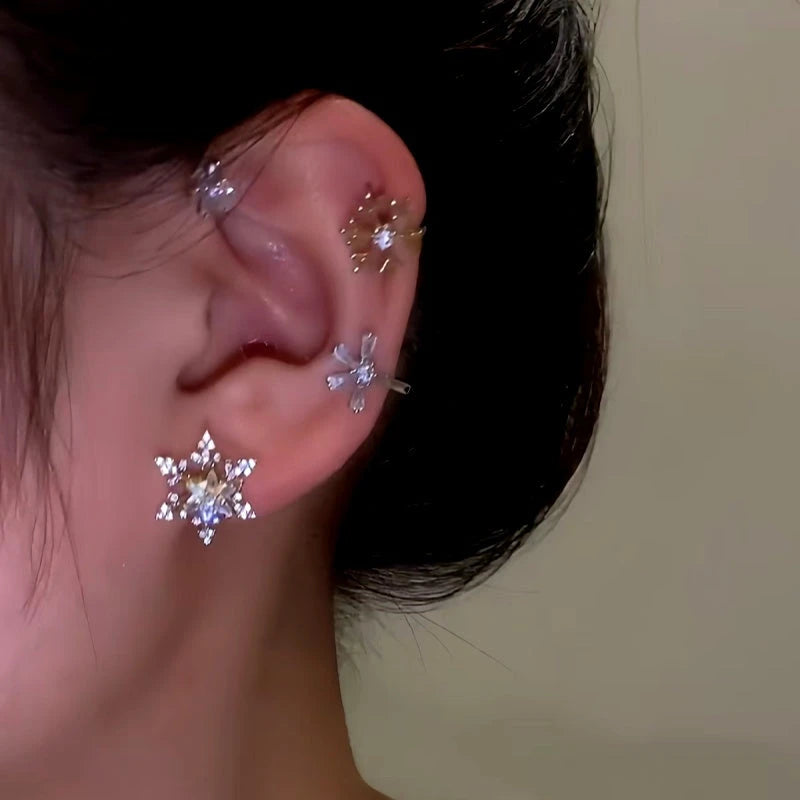 Close-up detail of the sparkling zircons and plating on the Snowflake Ear Cuffs
