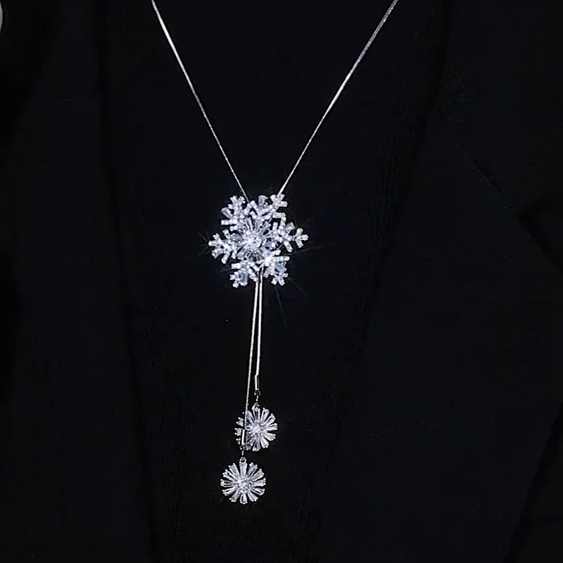 Close-up of the pendant and clasp on the Rotating Snowflake Necklace