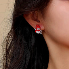 Close-up detail of the sparkling zircons and plating on the Snowman Stud Earrings