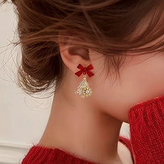 Close-up detail of the sparkling zircons and plating on the Christmas Tree Bow Earrings