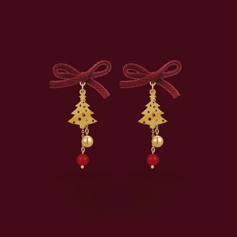 Close-up detail of the sparkling zircons and plating on the Christmas Tree Bow Earrings