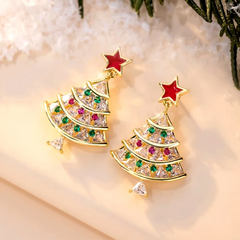 Model showcasing the dangle and style of the 14K Gold-Plated Christmas Tree Zircon Star Earrings