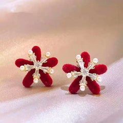 Close-up detail of the sparkling zircons and plating on the Velvet Snowflake Earrings