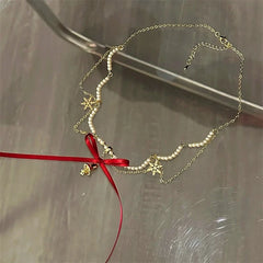 Close-up of the pendant and clasp on the Christmas Beaded Necklace