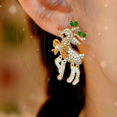 Angled view of the 14K Gold-Plated Christmas Zircon Diamond Little Elk Artificial Pearl Earrings