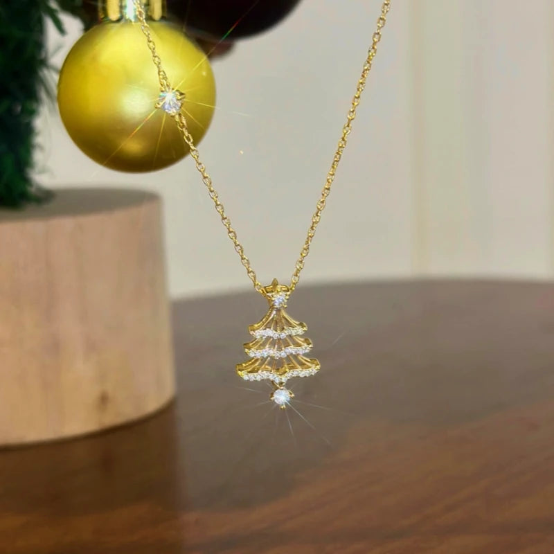 14K Gold-Plated Christmas Zircon Tree Earrings worn to showcase its length and pendant detail