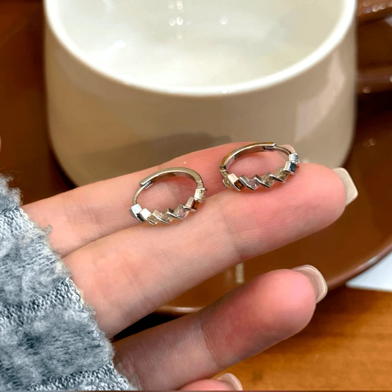 Angled view of the 14K Gold-Plated Colorful Diamond Hoop Earrings