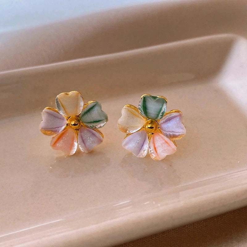 Angled view of the 14K Gold-Plated Colorful Flower Stud Earrings