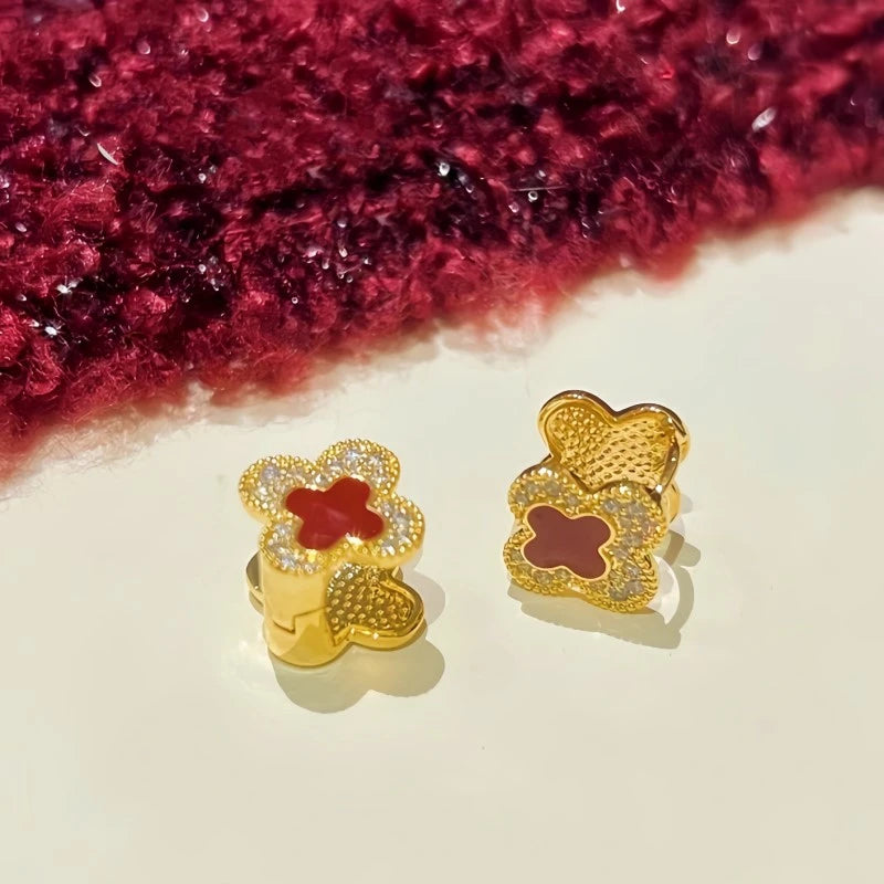 Angled view of the 14K Gold-Plated Contrasting Printed Clover Earrings