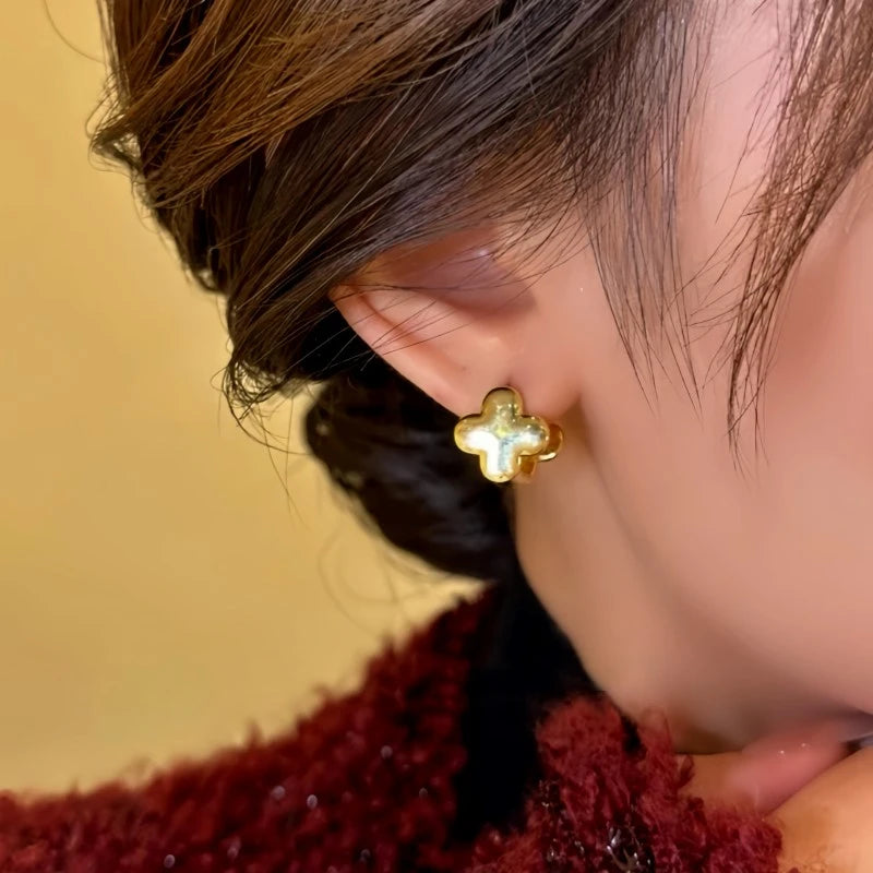 Close-up detail of the sparkling zircons and plating on the Printed Clover Earrings