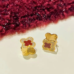Angled view of the 14K Gold-Plated Contrasting Printed Clover Earrings