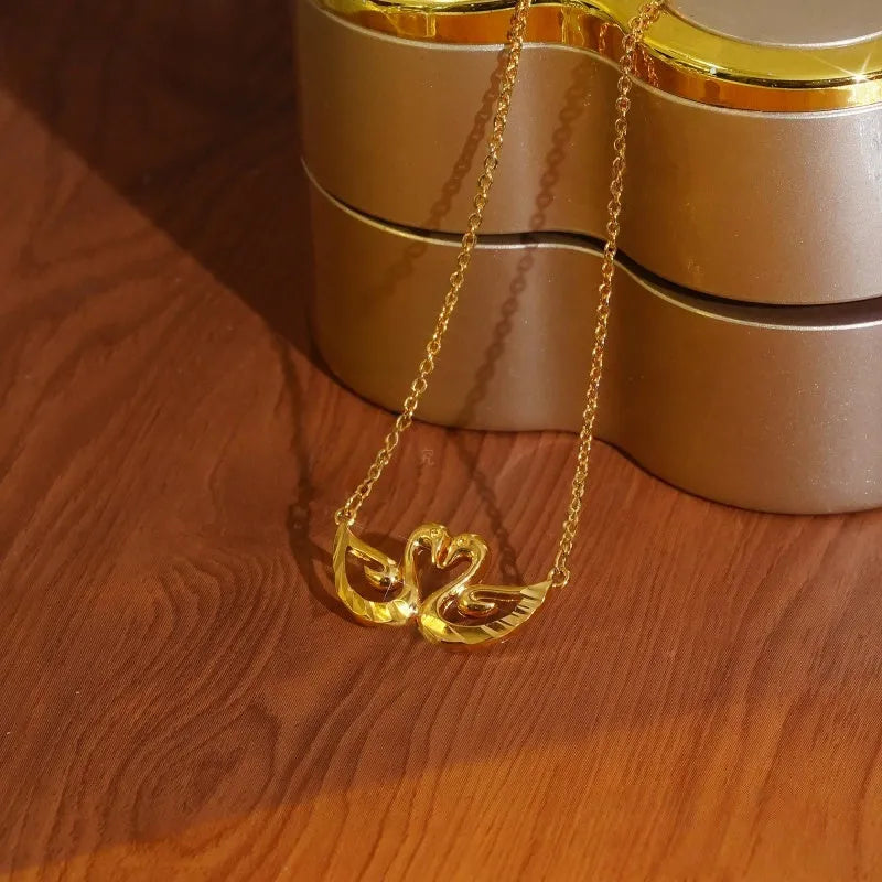 14K Gold-Plated Couple Swan Necklace worn to showcase its length and pendant detail