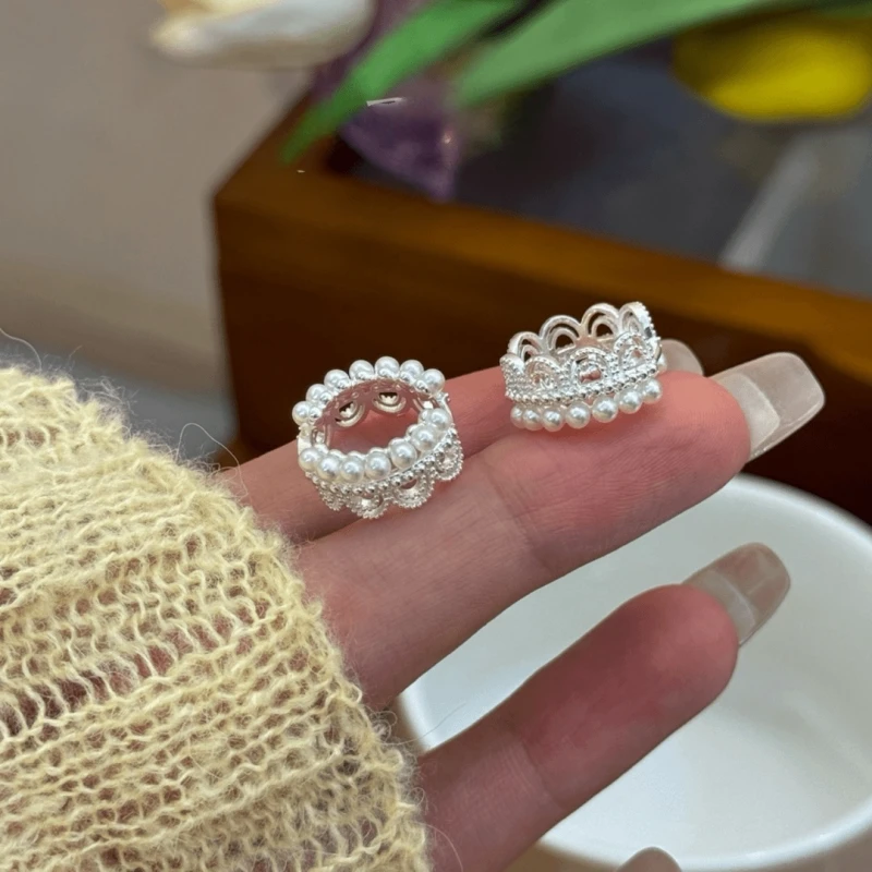 Angled view of the 14K Gold-Plated Crown Pearl Hoop Earrings