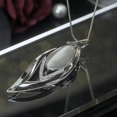 14K Gold-Plated Crystal Diamond-Studded Multi-Layer Leaf Sweater Chain Necklace worn to showcase its length and pendant detail