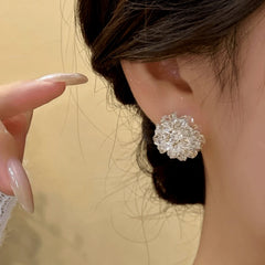 Close-up detail of the sparkling zircons and plating on the Crystal Flower Studs