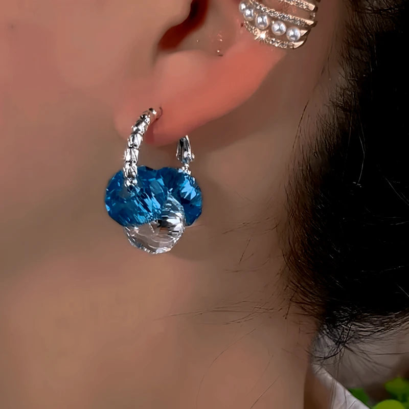 Close-up detail of the sparkling zircons and plating on the Blue Crystal Hoops