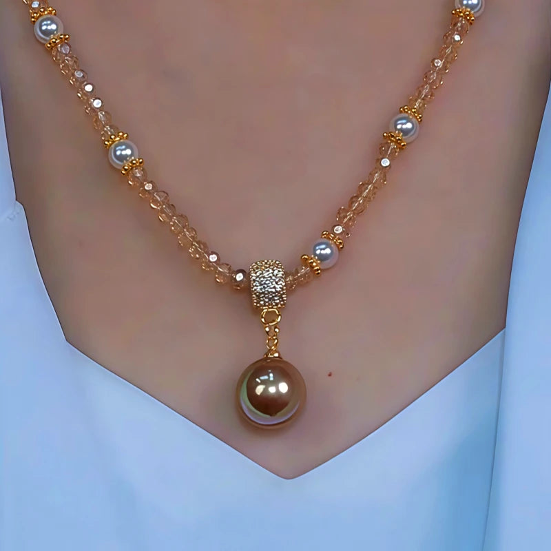 14K Gold-Plated Crystal Pearl Necklace worn to showcase its length and pendant detail