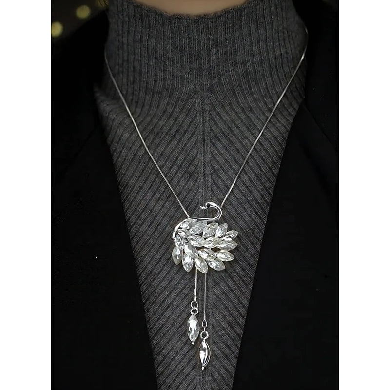 Close-up of the pendant and clasp on the Crystal Swan Necklace