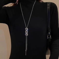 14K Gold-Plated Crystal Sweater Chain Necklaces worn to showcase its length and pendant detail