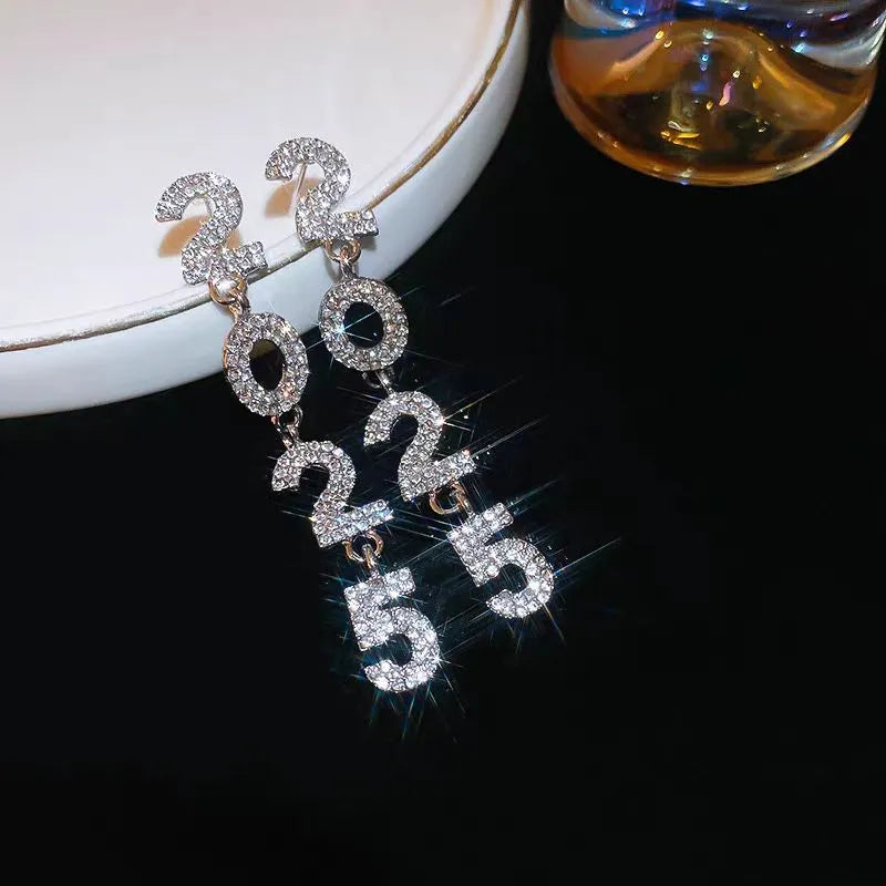 Close-up detail of the sparkling zircons and plating on the 2025 Earrings