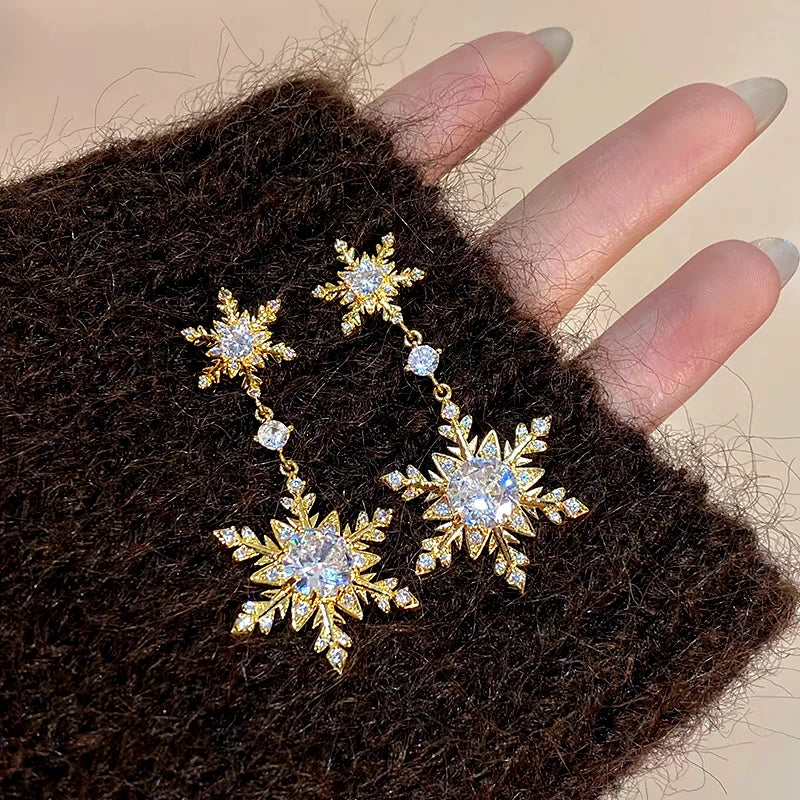 Angled view of the 14K Gold-Plated Diamond Christmas Double Snowflake Earrings