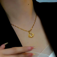 Close-up of the pendant and clasp on the Diamond Crown Necklace