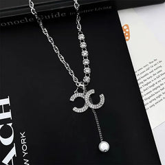 Detailed view of the 14K Gold-Plated Diamond Double C Letter Pendant Necklaces chain and pendant