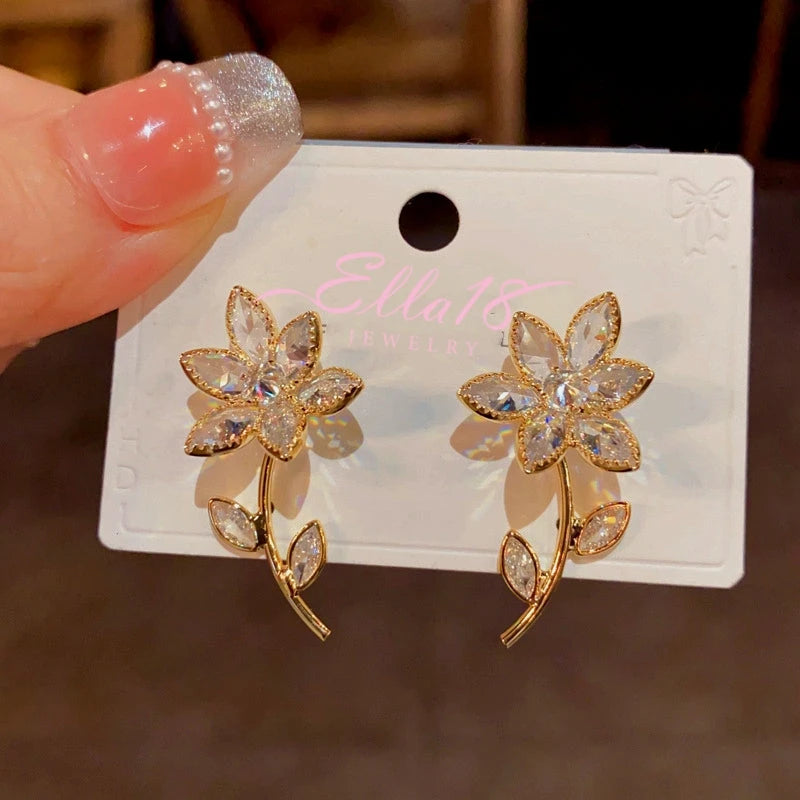 Angled view of the 14K Gold-Plated Diamond Flower Earrings