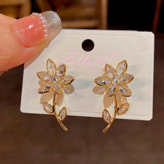 Angled view of the 14K Gold-Plated Diamond Flower Earrings